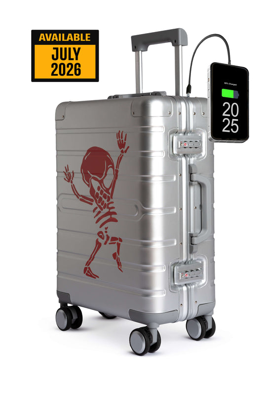 Silver suitcase with digital display and skeleton design on a white background