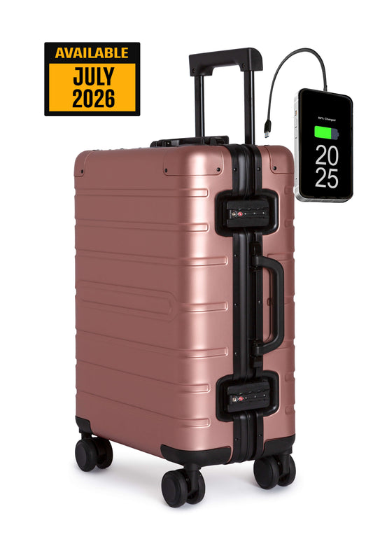 Rose gold suitcase with digital temperature display on a white background
