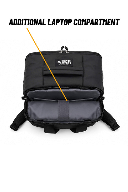 A black shoulder bag shown open on a white background, with text reading 'ADDITIONAL LAPTOP COMPARTMENT' and a yellow arrow pointing to the expanded interior compartment.