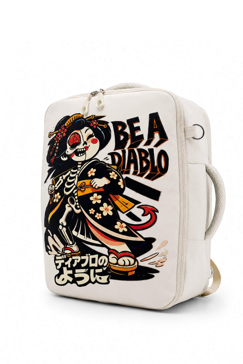 An off-white canvas backpack featuring a Day of the Dead skeleton character in a kimono and the text 'BE A DIABLO' alongside Japanese text, set against a plain white background.